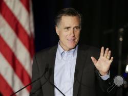 n this Jan. 16, 2015, file photo, Mitt Romney, the former Republican presidential nominee, speaks during the Republican National Committee's winter meeting aboard the USS Midway Museum in San Diego. Romney charged into the increasingly divisive 2016 GOP White House sweepstakes Thursday, March 3, 2016, with a harsh takedown of front-runner Donald Trump. (AP Photo/Gregory Bull, File)