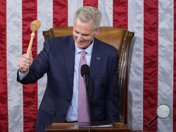 Incoming House Speaker Kevin McCarthy of Calif., holds the gavel on the House floor at the U.S. Capitol in Washington, early Saturday, Jan. 7, 2023. (AP Photo/Andrew Harnik)