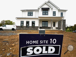 FILE - A home under construction marked as "SOLD" at a development in Eagleville, Pa., is shown on Friday, April 28, 2023. The United States is slogging through a housing affordability crisis that was decades in the making. The shortage pours cold water on President Joe Biden's assurances that the U.S. economy is strong and underscores the degree to which Republican presidential candidate, former President Donald Trump, has largely overlooked the issue. (AP Photo/Matt Rourke, File)