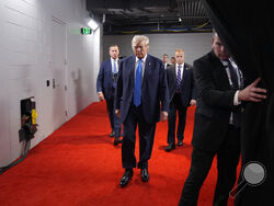 Republican presidential candidate former President Donald Trump arrives during the second day of the Republican National Convention at the Fiserv Forum, Tuesday, July 16, 2024, in Milwaukee. (AP Photo/Evan Vucci)