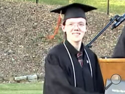 This June 3, 2022 still image taken from video provided by the Bethel Park School District shows student Thomas Matthew Crooks in the 2022 Bethel Park High School Commencement in Bethel Park, Pa. (The Bethel Park School District via AP)