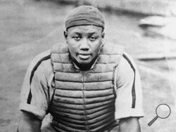 FILE - Baseball catcher Josh Gibson in an undated photo. Josh Gibson became Major League Baseball’s career leader with a .372 batting average, surpassing Ty Cobb’s .367, when records of the Negro Leagues for more than 2,300 players were incorporated after a three-year research project. (AP Photo/File)