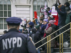 A coalition of community groups and advocates for the How Many Stops Act coalition hold a rally at City Hall, Tuesday, Jan. 30, 2024, in New York, to urge the City Council to override Mayor Adams veto of the act, requiring police officers to document basic information whenever they question someone. (AP Photo/Bebeto Matthews)