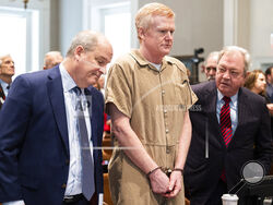 Alex Murdaugh speaks with his legal team before he is sentenced to two consecutive life sentences for the murder of his wife and son by Judge Clifton Newman at the Colleton County Courthouse on Friday, March 3, 2023 in in Walterboro, S.C. (Joshua Boucher/The State via AP, Pool)