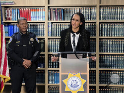 San Francisco District Attorney Brooke Jenkins addresses reporters at a news conference with Police Chief William Scott standing next to her on Monday, Oct. 31, 2022, in San Francisco. Jenkins announced state charges against David DePape, including attempted murder. DePape is accused of breaking into the home of House Speaker Nancy Pelosi and attacking her husband with a hammer. (AP Photo/Terry Chea)