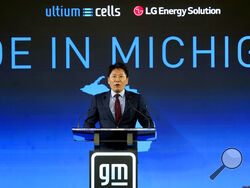 FILE - Kim Dong-Myung, LG Energy Solution Head of Advanced Automotive Battery Division (EVP), speaks during a news conference in Lansing, Mich., Tuesday, Jan. 25, 2022. A joint venture between General Motors and South Korean battery company LG Energy Solution has closed on a $2.5 billion federal loan to help finance three lithium-ion battery cell plants in Ohio, Tennessee, and Michigan. (AP Photo/Paul Sancya, File)