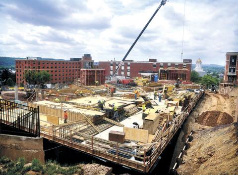 Construction continues, on Thursday, on the new seven-story dormitory on the Bloomsburg University campus that will include on the first floor the university store and a food service area. The 162,000 square-foot structure is expected to be completed by July 2017.