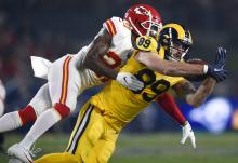 Los Angeles Rams tight end Tyler Higbee (89) catches a pass in front of Kansas City Chiefs strong safety Eric Murray, left, during the first half of an NFL football game Monday, Nov. 19, 2018, in Los Angeles. (AP Photo/Kelvin Kuo)