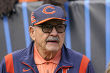 FILE - Chicago Bears great Dick Butkus watches from the sideline during the first half of the team's NFL football game against the Houston Texans on Sept. 25, 2022, in Chicago. Butkus, a fearsome middle linebacker for the Bears, has died, the team announced Thursday, Oct. 5, 2023. He was 80. According to a statement released by the team, Butkus' family confirmed that he died in his sleep overnight at his home in Malibu, Calif. (AP Photo/Nam Y. Huh, File)