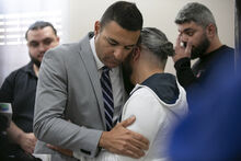  Ahmed Rehab, left, executive director of the Chicago chapter of the Council on American-Islamic Relations, embraces Odey Al-Fayoume, father of Wadea Al-Fayoume, 6, at a news conference at the Muslim Community Center on Chicago's Northwest Side, Sunday, Oct. 15, 2023. Authorities say a 71-year-old Illinois man has been charged with a hate crime, accused of fatally stabbing a 6-year-old boy and seriously wounding a 32-year-old woman, in Plainfield Township, because of their Islamic faith and the Israel-Hamas
