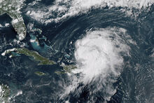 NOAA via AP/ This GOES-16 GeoColor satellite image taken at 4 p.m. Wednesday and provided by National Oceanic and Atmospheric Administration shows Hurricane Ernesto northwest of San Juan, Puerto Rico and moving over open waters.