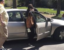 Katherine Russell Tsarnaev, center, wife of killed Boston Marathon bombing suspect Tamerlan Tsarnaev, exits a car at the home of her parents in North Kingstown, R.I. At left is her father, Warren Russell. Federal authorities have asked to speak with her, and her lawyer said he is discussing with them how to proceed. (AP Photo/Katie Zezima)