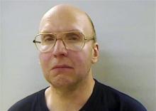 his April 2013 booking photo released by the Kennebec County Sheriff's Office in Augusta, Maine, shows Christopher Knight, arrested Thursday, April 4, 2013, while stealing food from a camp in Rome, Maine. Authorities said Knight, known as the North Pond Hermit and who lived for 27 years in the woods of central Maine, may be responsible for more than 1,000 burglaries.