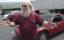 This photo taken May 22, 2013 shows Rockne Newell talking about his trials and tribulations with Ross Township, Pa., over junk on his property. Newell is the suspect in a shooting Monday that killed three and hurt at least two others. Witnesses say he barged into a municipal meeting room and began shooting before being tackled by a local official and possibly another person. (AP Photo/Pocono Record, Keith R. Stevenson)