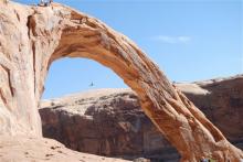 This photo taken Nov. 4, 2012 shows an unidentified person swinging from the Corona Arch near Moab, Utah. A 22-year-old man was killed Sunday, March 24, 2013 trying to swing through the opening of the 110-foot, 33-meter-tall, sandstone arch in a stunt made so popular on YouTube that state authorities recently banned the daredevil activity by commercial outfitters. (AP Photo/The Salt Lake Tribune, Brian Maffly)