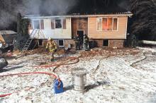 A fire severely damaged a house on Twin Church Road early Thursday. The fire call came in at 4:06 a.m., and firefighters from Summerhill, Berwick and Mifflinville were on scene until 8:23 a.m. (Press Enterprise/Keith Haupt)