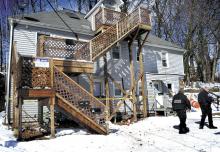 Police, on Thursday, investigate a shooting that took place on Wednesday night in a first-floor apartment at 351 Fetterman Ave. in Bloomsburg. (Press Enterprise/Bill Hughes)