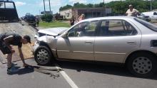 A crew from Mausteller's Towing removes Debbie Force's Toyota Camry from the road following an accident of Route 11 Wednesday afternoon. (Press Enterprise/Julye Wemple) 