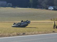 A car came to rest upside down in a cornfield Friday on Southern Drive. (Press Enterprise/Julye Wemple)