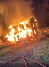 Special to the Press Enterprise/Fire engulfs a house in Beach Haven Sunday night. A dog died in the blaze.