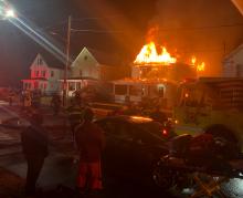 Flames shoot from the roof of 1324 Fairview Ave. on Monday morning. (Press Enterprise/Peter Kendron)