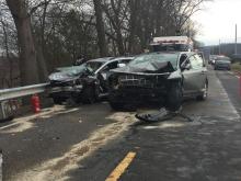 Two vehicles remain in the roadway after they collided along the Mifflinville-Nescopeck Highway. (Press Enterprise/Kristin Baver)