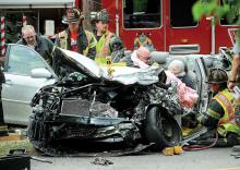 Berwick Rescue crews work to free Patricia McLaughlin, 76, of Bloomsburg from her car Thursday after she collided with a pickup truck along Route 11 at Rittenhouse Mill Road in Briar Creek Borough. (Press Enterprise/Keith Haupt)