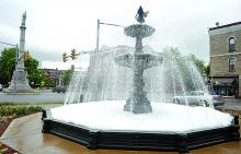 The Bloomsburg town fountain is shown Sunday morning after it was discovered dish detergent was poured into it overnight, creating a tub of foam. (Press Enterprise/M.J. Mahon) 