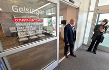 Geisinger physician Karl Luxardo and operations manager Tracey Bower stand in front of the new ConvenientCare that will be opening in the former Geisinger office building along Mall Boulevard in Buckhorn.