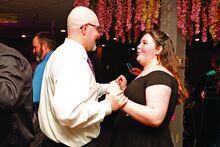 Izzy Firth, right, dances with her dad Collin Firth, left, on Sunday during the daddy-daughter dance, hosted by the Berwick YMCA, at the Berwick Golf Club. 