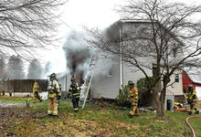 Firefighters battle a smoky blaze Thursday morning at 33 Valley Road in Briar Creek Township. Seven pets were lost, officials reported.