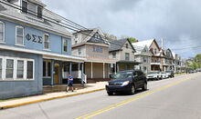 Fraternity and Sorority houses along Lightstreet Road are shown here Thursday afternoon. Bloomsburg University has terminated its Greek Life program.