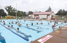 Bathers, including campers from Camp Epachiseca at Zaners Bridge,  take to the water at the Little Fishing Creek Area Swimming Pool in Millville on Monday afternoon. The pool is open six days a week from noon to 7 p.m. and Sunday from 1 p.m. to 7 p.m. There is an adult swim from 11 a.m. to noon Monday to Saturday and noon to 1 p.m. on Sunday. Sunday admission is half price. 