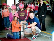 Fire safety part of visit to fire hall