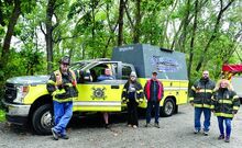 Press Enterprise/Bill Hughes Members of the West Berwick Hose Company, from left, Christopher Cashman, Fire Chief Corey Wark, Sabrina Fish, Jeff Showers, Rodney Fish and Cybil Fish stand by the company’s new truck, Rehab Unit 132 on Sunday. The truck carries rest area equipment for first responders at emergency incidents. The cost of the truck is $85,000 and the equipment it carries cost an additional $30,000.