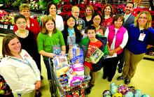 Danville Middle School students recently completed a reading and fundraising project – Read to Feed – with Weis Markets and contributed $500 to the Danville Community Christmas Tree. 