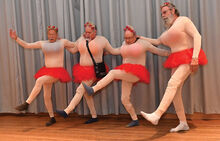 Posing as members of the Radio City Rockettes, from left, Dick Fink, Cary Rhoddmoyer, Joe Smith and Jim Gill perform while at the Annual Water Creatures Spectacular, which was held at Good Shepherd Lutheran Church in Berwick Monday. The Water Creatures are all the adults who attend classes at the Berwick YMCA pool. 