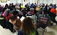 Firefighters from the different fire department in Berwick fill the council chamber Monday night expecting discussion of whether Eagle Hose Co. should be dissolved. Despite the crowd, no one offered a comment during a public comment period.