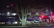  State police and officers from at least two counties use lighting from the East End Fire Company to investigate a shooting in the Geisinger parking lot at the intersection of Red Lane and Power Mill Road Friday evening. 