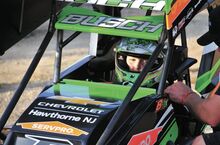 Brexton Busch, 9, son of NASCAR driver Kyle Busch, sits and waits his turn to get on track with his Junior Sprint car Tuesday night at Greenwood Valley Action Tracks. He won the feature. See story on p. 11.