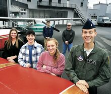 Area high school students moving on from Turn2Aviation to the United States Air Force and Embry-Riddle Aeronautical University are, from left, Katherine Geffken, Benton; Landon Ferrara, Southern Columbia; Lucy Pickle, Danville; and Jude Sterling, Meadowbrook Christian. Standing behind the students at the Bloomsburg Airport on Saturday morning are Daniel Cedeno, left, flight instructor, and Rob Staib, flight instructor and co-owner of Turn2Aviation.