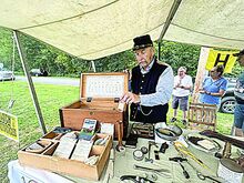 Robert Marut shows his squab pannier, a portable medicine chest used by Civil War doctors, as part of Catawissa’s 250th Anniversary celebration Saturday. He began his Civil War re-enactment career as part of the re-creation of the Catawissa Guards.