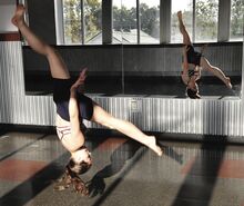 Lynzee Kershner demonstrates a side aerial, or hands-free cartwheel, Tuesday at the Berwick YMCA.