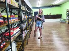 Elizabeth Lieberman on a walk through her newly opened health food store on Mill Street. “Food for Thought” offers a variety of good tasting health options for customers.