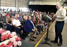 Dillon Floral President Rob Dillon speaks to those gathered for the Floral Extravaganza to mark the company’s 150 years in business at the offices and greenhouses in Bloomsburg on Tuesday evening.