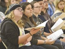 Bloomsburg’s Kiernan Adams, at left in photo at left above, listens to the director during rehearsal for the members of the District 8 Choir at the Caldwell Consistory. The group perform at 7 tonight at the Haas Center for the Arts at Commonwealth University - Bloomsburg.