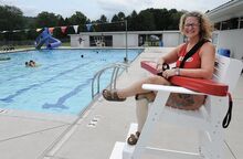 Colleen Tarantino, head lifeguard at the Bloomsburg town pool, sits in one of the lifeguard chairs Friday. 