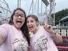 Sisters Carrie Dressler, left, and Regina Welkie pose in front of the Jet Star roller coaster in France’s Luna Park. The Shamokin natives tracked down the roller coaster at its new home in France earlier this year.