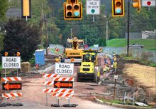 The concrete curbs are nearly fi nished along Poplar Street near the Bloomsburg Airport Thursday afternoon. A two-year project that will redo the roadway from Main Street to the Bloomsburg Airport and Route 11 to Park Street is underway