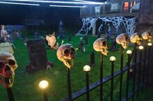 This display behind a home on Walnut Street in Fernville is one of a few new graveyards in the village for Halloween. Homeowners Mark and Debbie Minter go all out with decorations